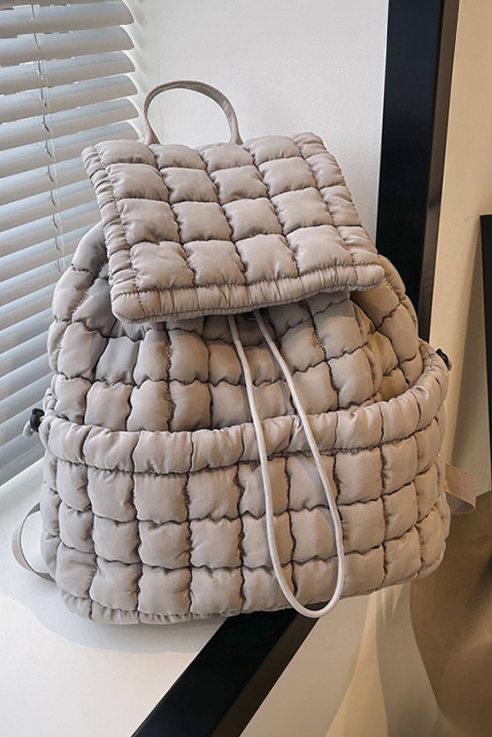 Pink Solid Flapped Quilted Puffer Backpack