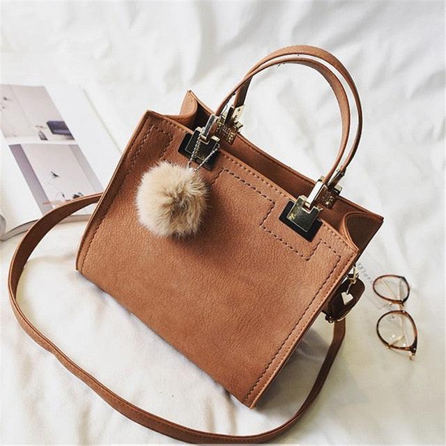 Suede Leather Handbag with Fur Ball - L & M Kee, LLC